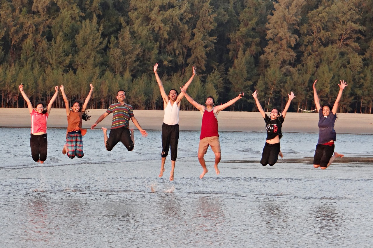 Group of people jumping with happy faces